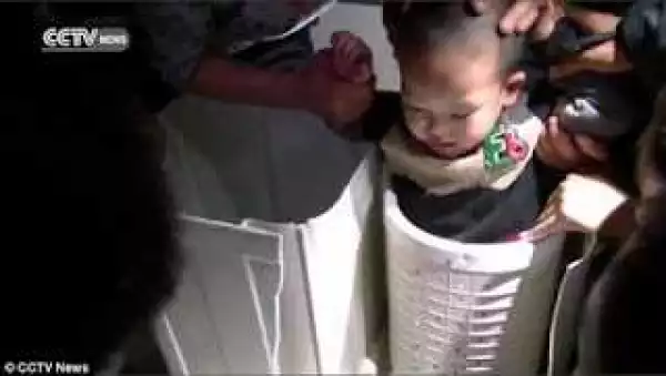 Little boy got rescued after getting stuck in a washing machine while playing. [Photos]